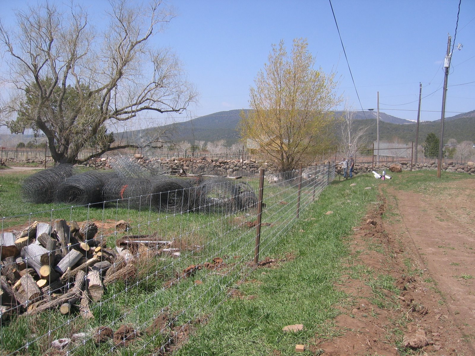 The new fence is up between fields. 