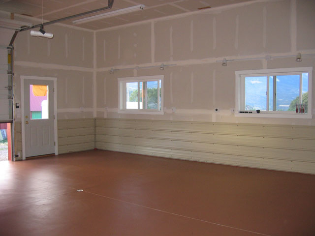 This side of the shop uses only white metal roofing.