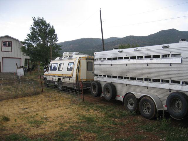 Ron Keener's transportation rig involves a livestock trailer towed by a small RV. 