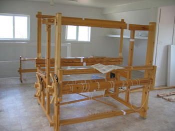 The new loom is fully assembled in the second floor of the shop.