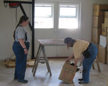 Oogie and Elena work on skirting fleeces together. 