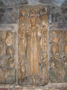 A close-up of the carvings on the Tomb of Sir Richard Herbert of Ewyas.