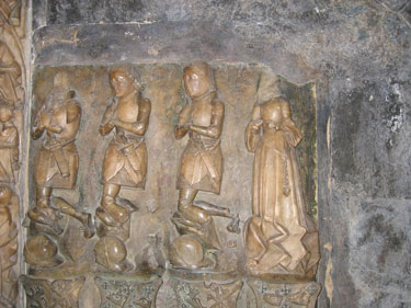 A close-up of the carvings on the Tomb of Sir Richard Herbert of Ewyas.