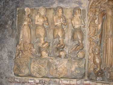 A close-up of the carvings on the Tomb of Sir Richard Herbert of Ewyas.