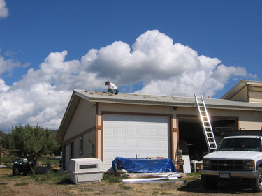 The roof is being prepped for panel mounts. 