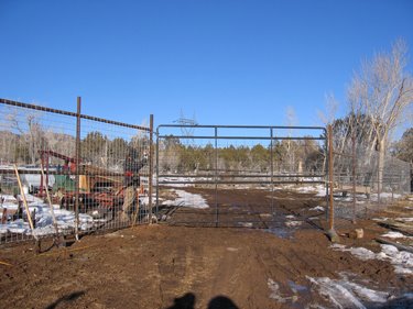 New gates to match the new extra-tall elk fences are going up. 