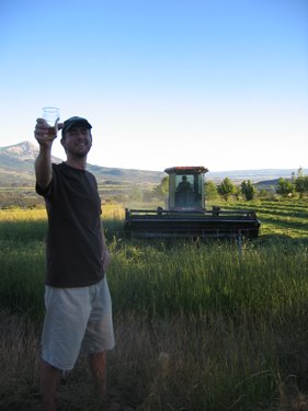 Greg, enjoying a local beer in the hayfield. 