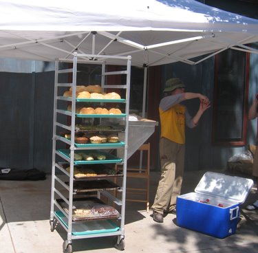 The Flying Fork's fresh baked goods are for sale in this booth.