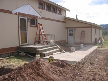 Concrete footers for the new porch will be poured soon.
