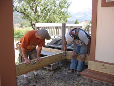 The framing for the porch is looking good. 