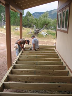 The deck trusses are fully secured in place, and the laying of the deck planks will begin soon. 