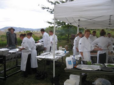 The students are busy preparing the feast.
