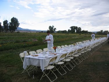 Here, a culinary student prepares the plates for the feast.