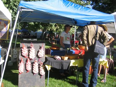 The Small Potatoes Farm booth at the Mountain Harvest Festival Farmers' Market.