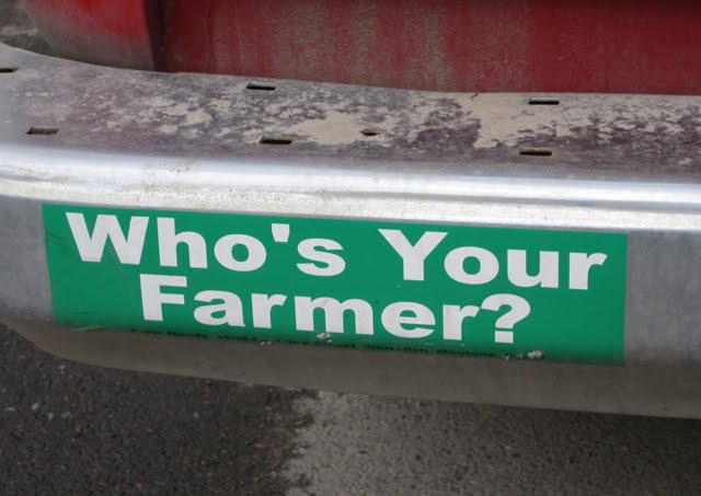A bumper sticker shows the text, "Who's Your Farmer?"
