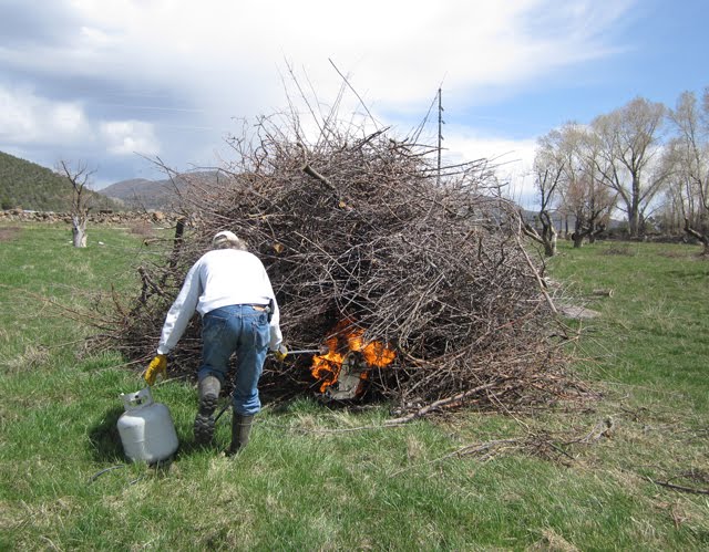 Ken is hard at work getting the fire started. 