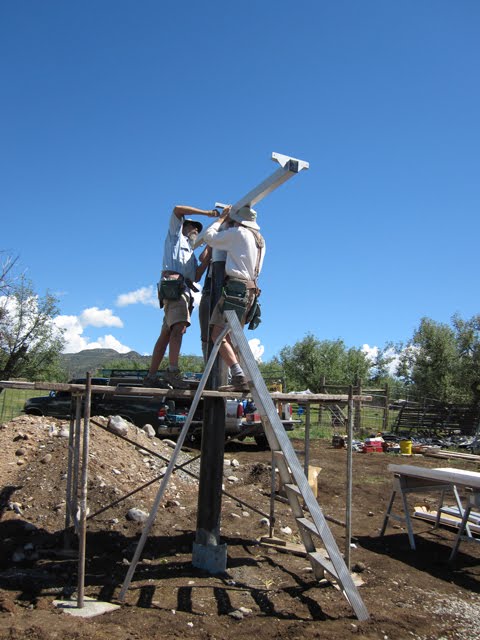 A large frame to hold the solar panel is arranged on top of the bracket.