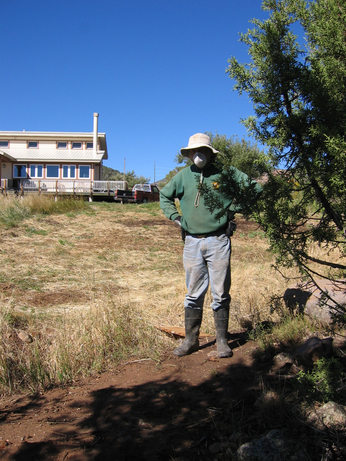 Ken stands next to more bear tracks.