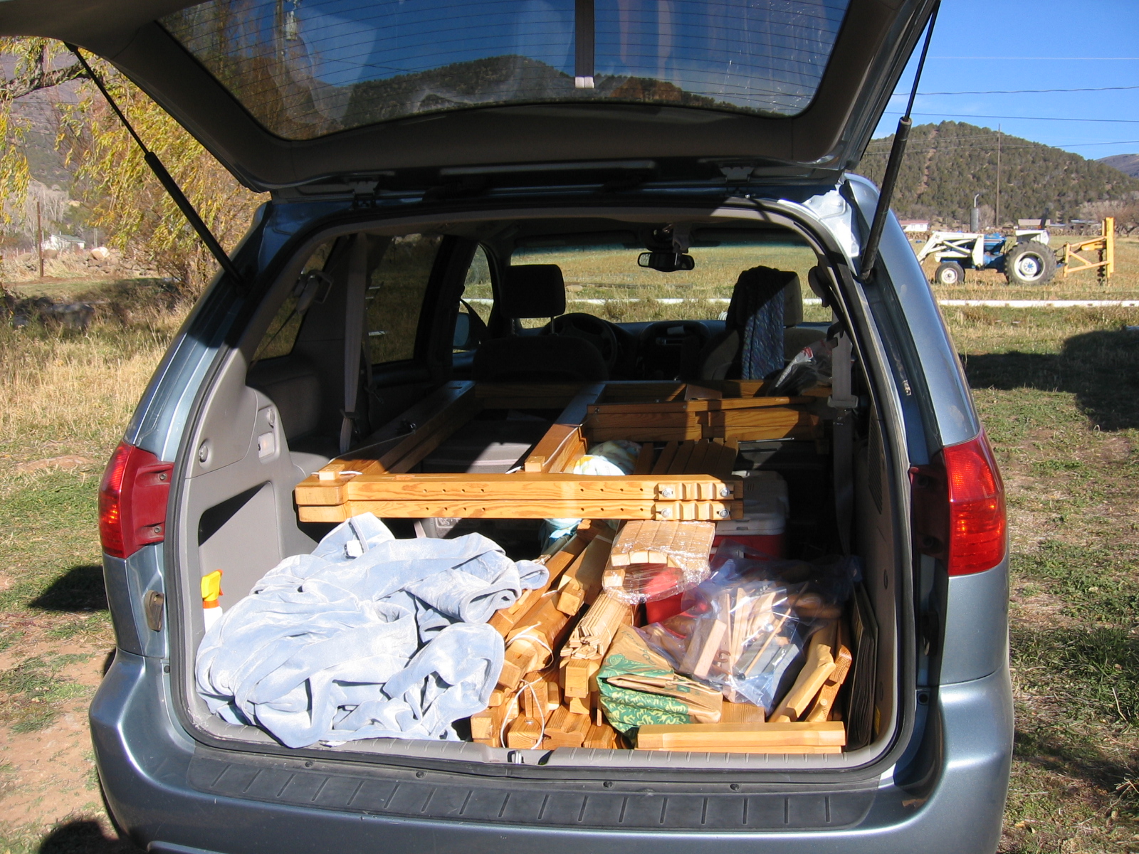 The disassembled loom is disassembled and safely packed into Erika's minivan. 