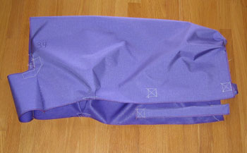 A picture of a purple sheep coat, fully completed. 