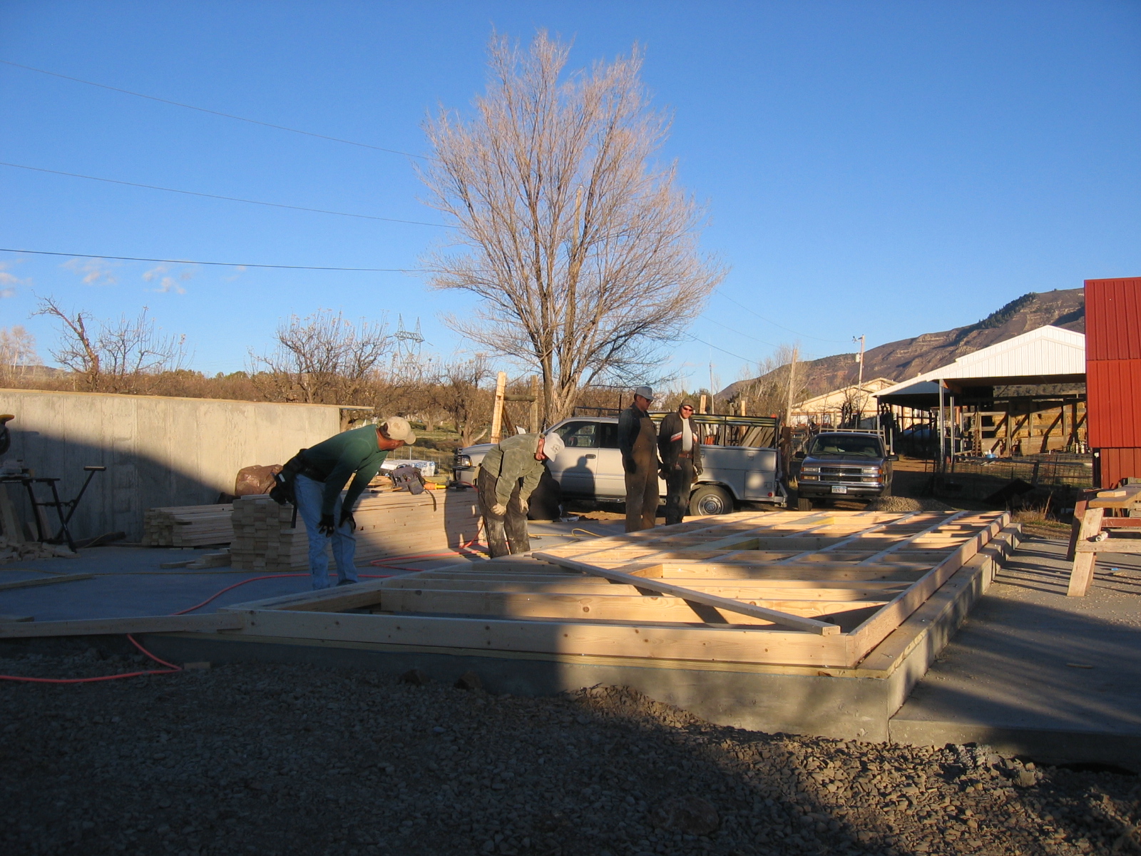 The first wall of the new shop is being constructed. 