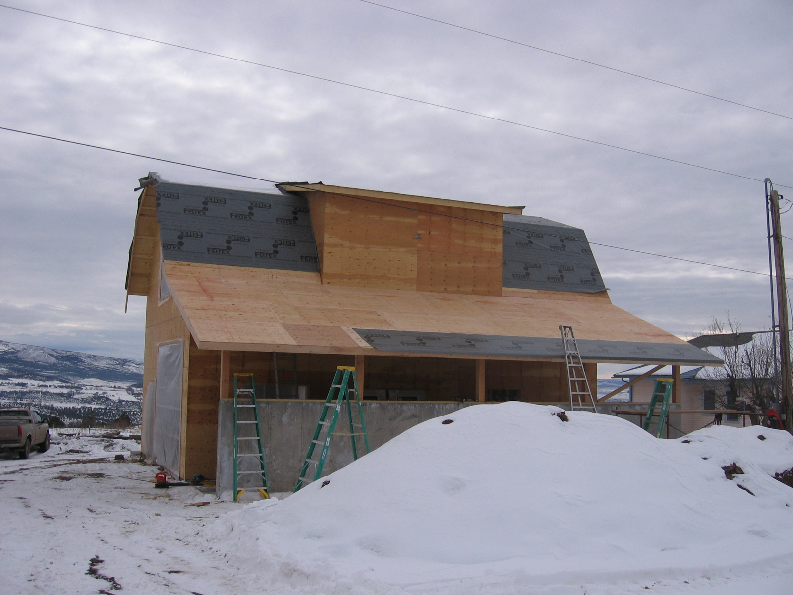 The new shop is mostly sheathed in plywood. 