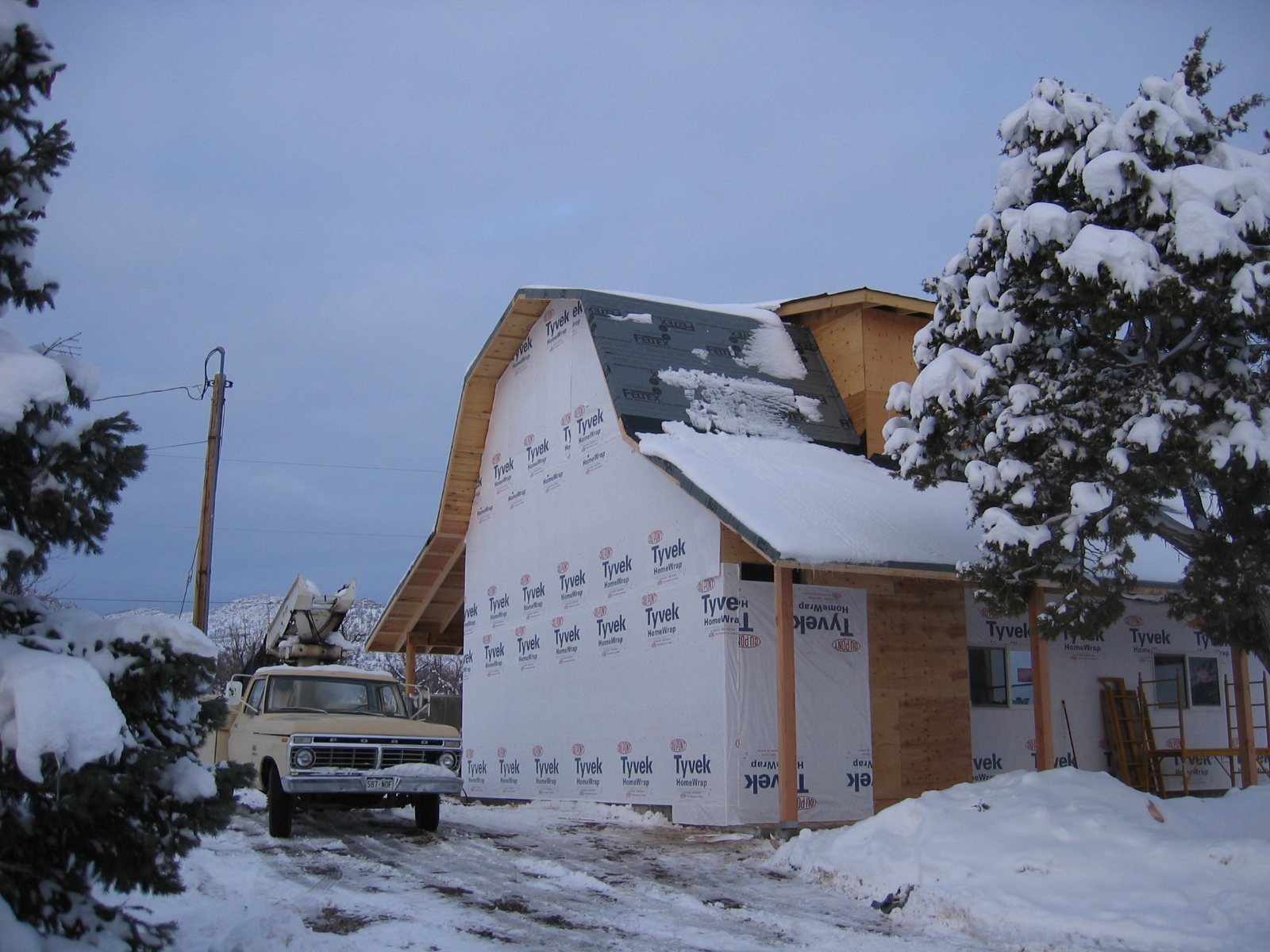 Tyvek has been applied to the exterior of the shop.