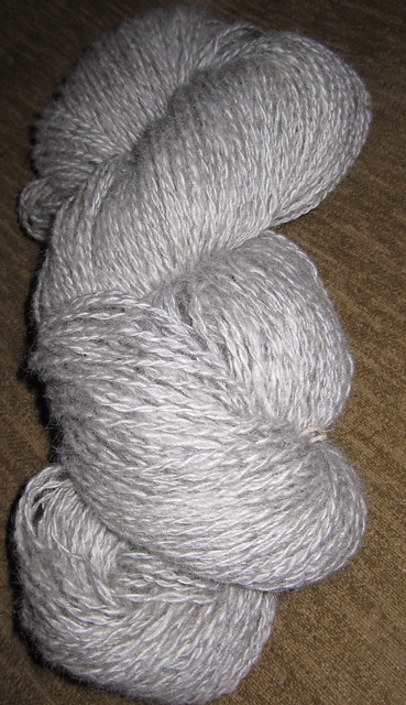 A skein of beautiful white Lincoln Longwool yarn.