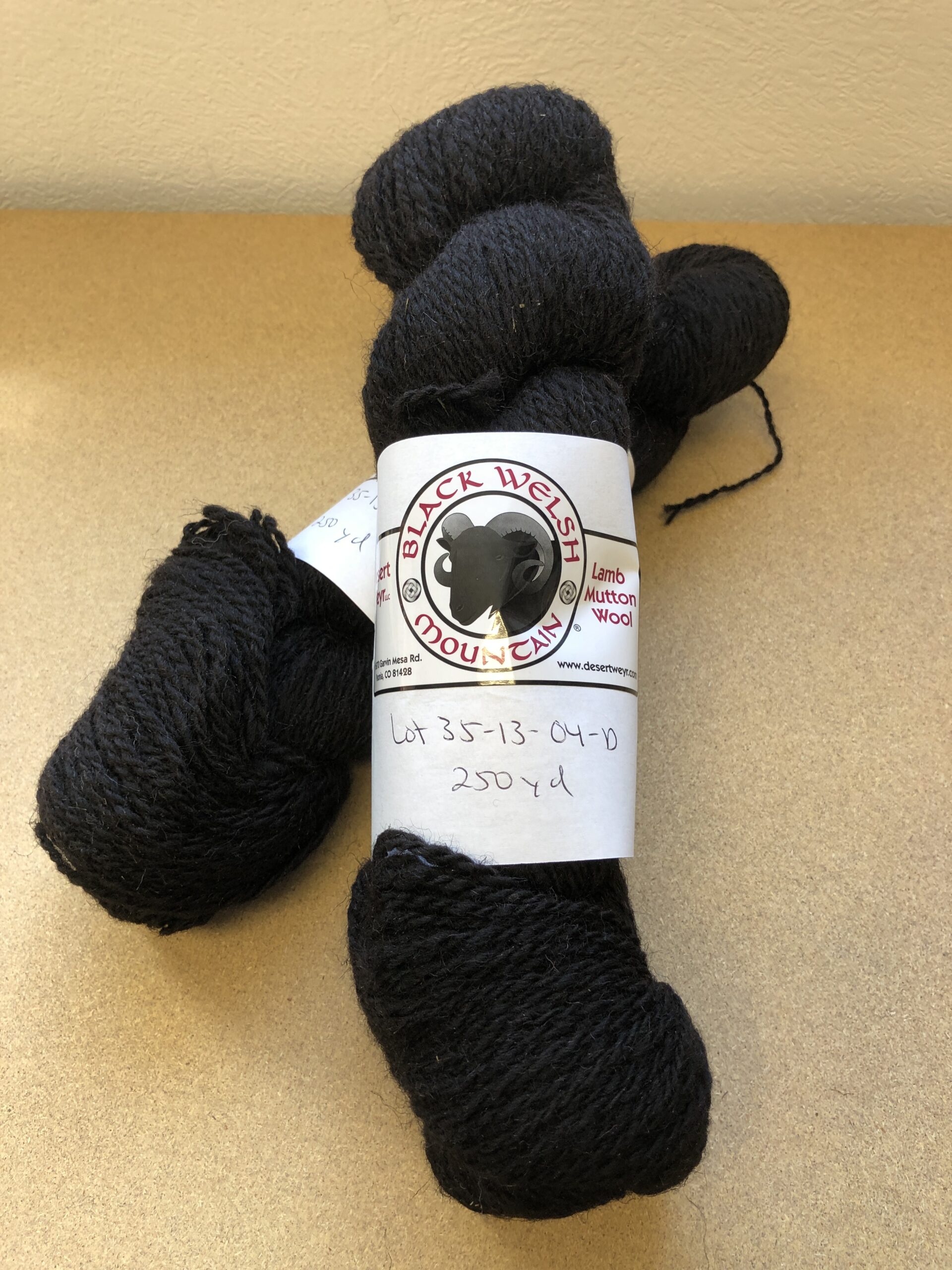 Black yarn spun from Black Welsh Mountain sheep wool.